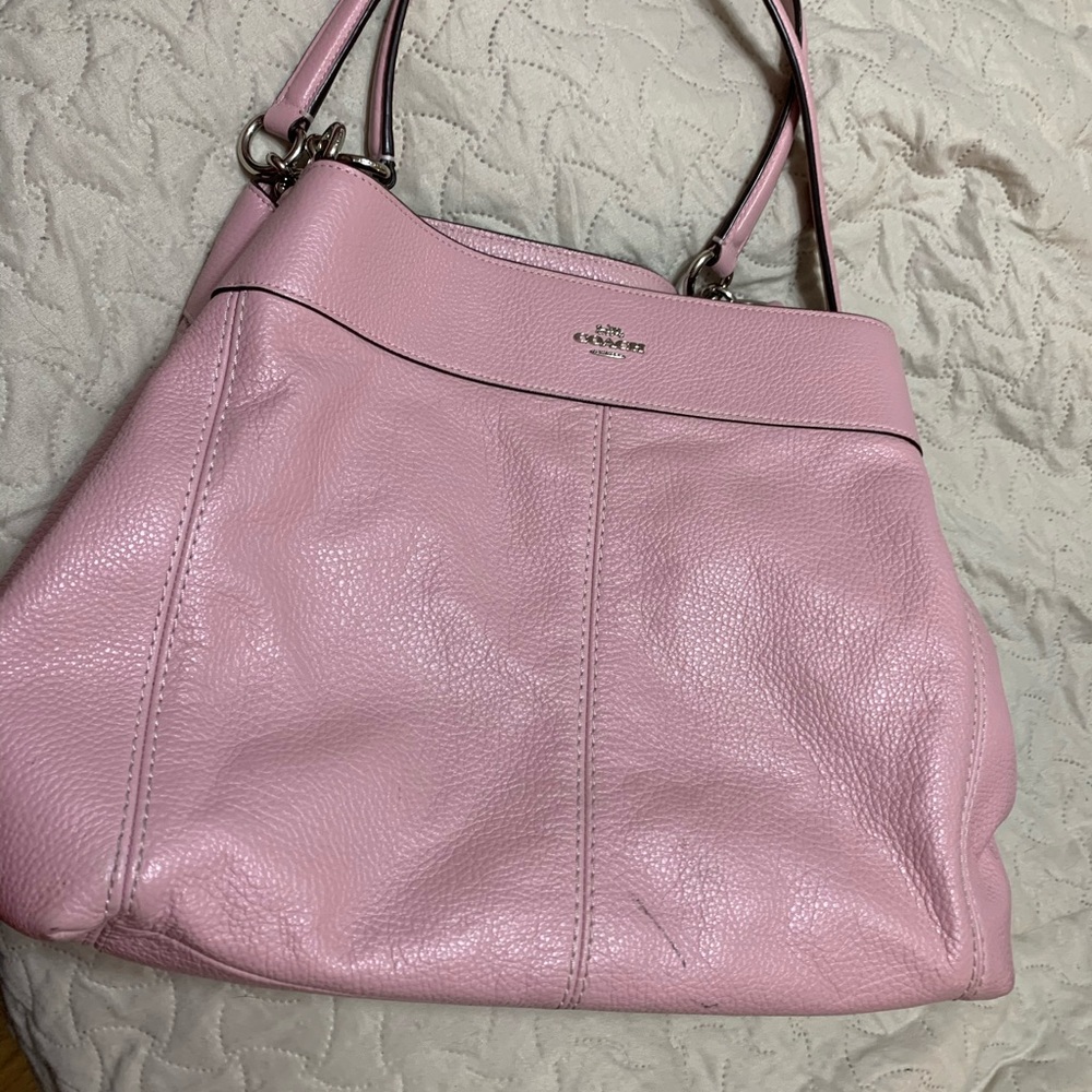 A beautiful light pink Coach Purse